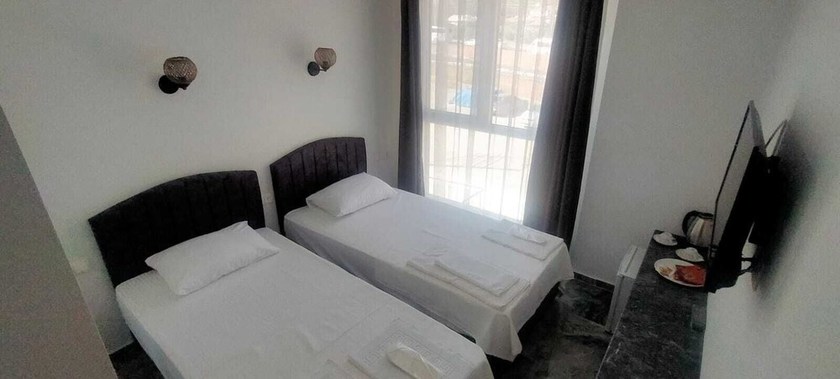 Imagen de la habitación del GRAND K&Ouml;SE AİRPORT HOTEL, Ortaca. Foto 15