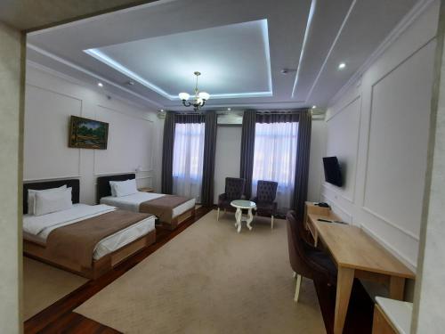 Imagen de la habitación del GRAND SARBON HOTEL. Foto 19