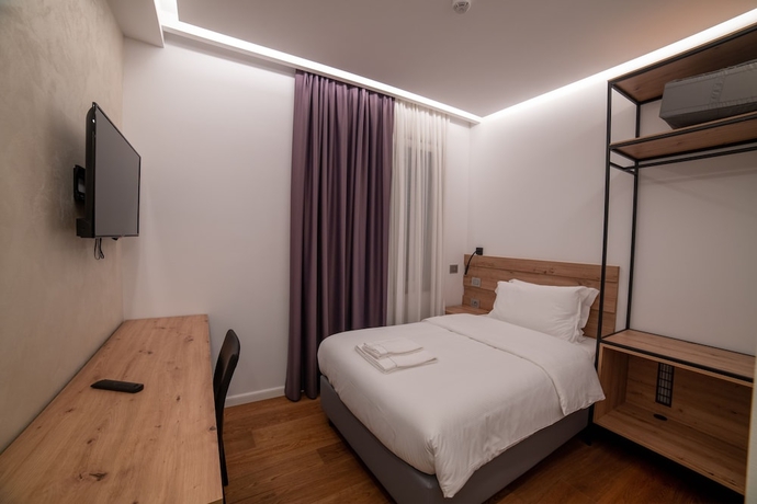 Imagen de la habitación del GRANDI 32 Boutique Residence. Foto 2
