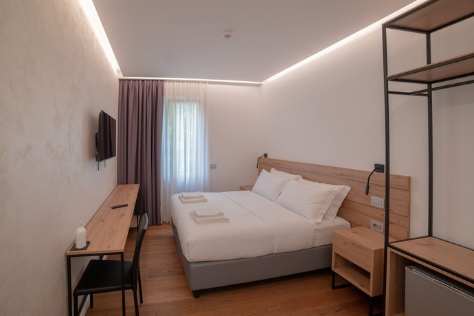 Imagen de la habitación del GRANDI 32 Boutique Residence. Foto 6