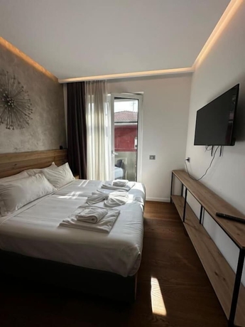 Imagen de la habitación del GRANDI 32 Boutique Residence. Foto 7