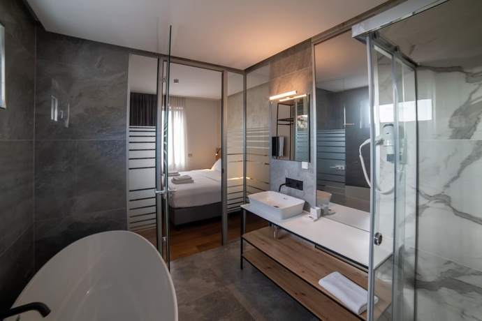 Imagen de la habitación del GRANDI 32 Boutique Residence. Foto 9