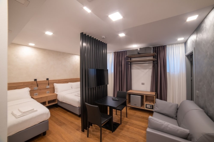 Imagen de la habitación del GRANDI 32 Boutique Residence. Foto 11