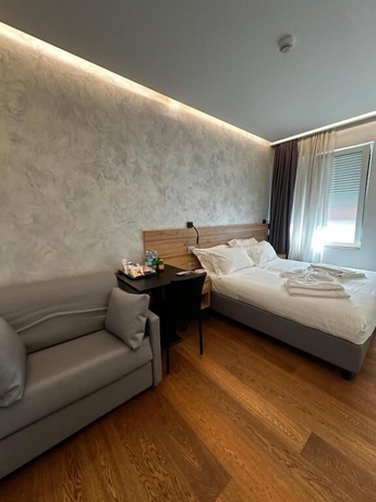 Imagen de la habitación del GRANDI 32 Boutique Residence. Foto 12