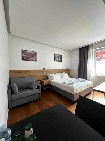 Imagen de la habitación del GRANDI 32 Boutique Residence. Foto 13