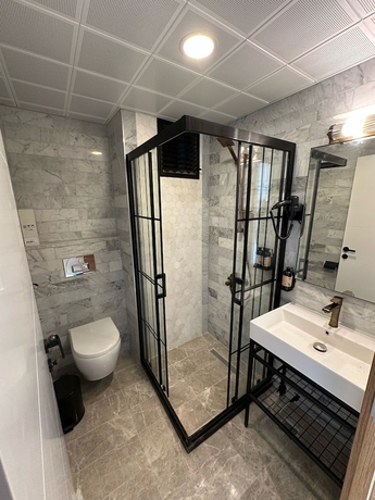 Imagen de la habitación del GRAPE HOTEL. Foto 14