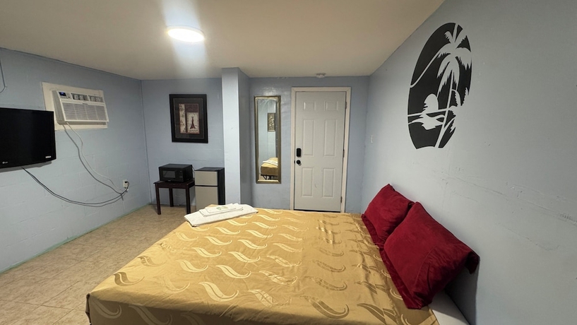 Imagen de la habitación del GREENKEY BEACH MOTEL. Foto 9