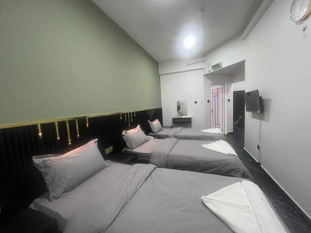 Imagen de la habitación del GUEST INN HOTEL LLC. Foto 19