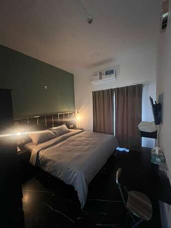 Imagen de la habitación del GUEST INN HOTEL LLC. Foto 20