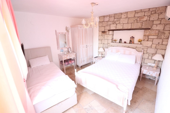 Imagen de la habitación del Galya Otel Alacati. Foto 15