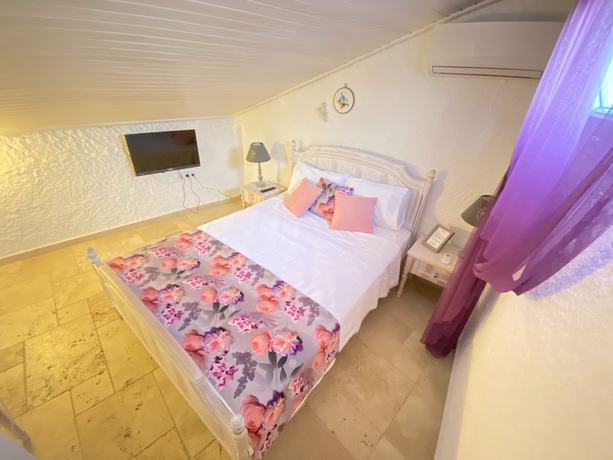 Imagen de la habitación del Galya Otel Alacati. Foto 18