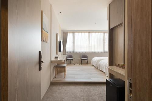 Imagen de la habitación del Gamalan Breeze Hotel. Foto 19