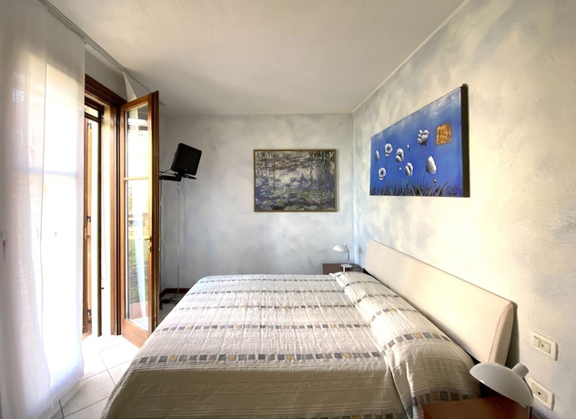 Imagen de la habitación del Garda Resort Village. Foto 16