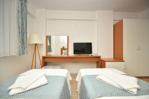 Imagen de la habitación del Garden Ada Hotel. Foto 2