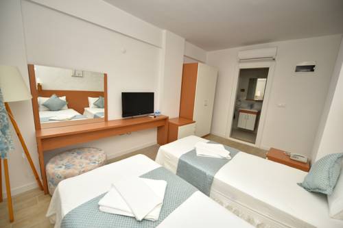 Imagen de la habitación del Garden Ada Hotel. Foto 3