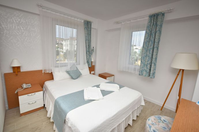 Imagen de la habitación del Garden Ada Hotel. Foto 10