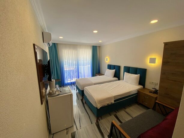 Imagen de la habitación del Garden Butik and Apart Hotel Akbuk. Foto 15