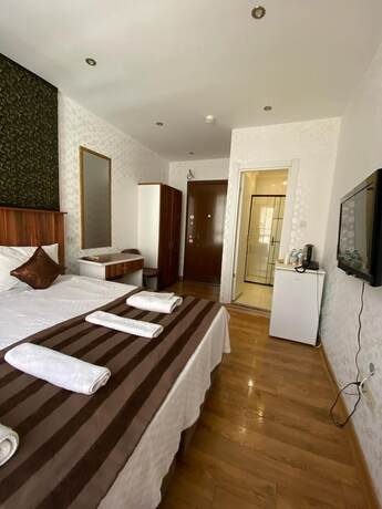 Imagen de la habitación del Garden Hill Hotel. Foto 14