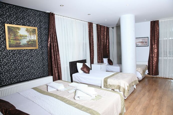 Imagen de la habitación del Garden Hill Hotel. Foto 16