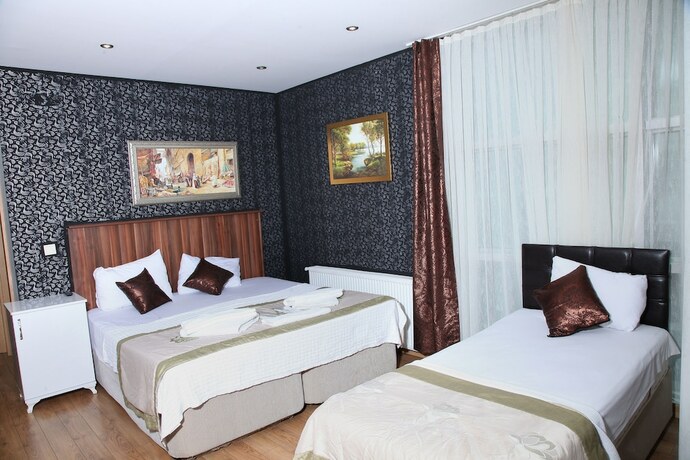 Imagen de la habitación del Garden Hill Hotel. Foto 19