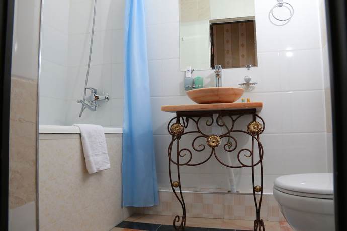 Imagen de la habitación del Garden Plaza Hotel. Foto 10