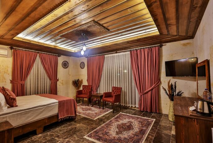 Imagen de la habitación del Garden Suites Hotel Cappadocia. Foto 12