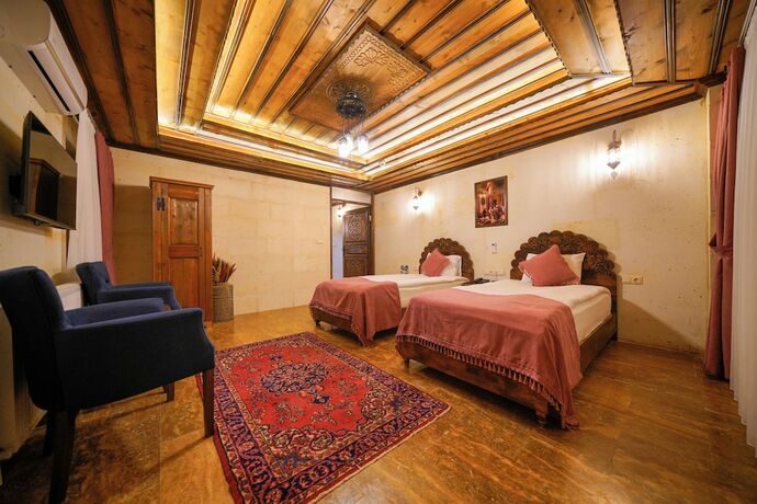 Imagen de la habitación del Garden Suites Hotel Cappadocia. Foto 14