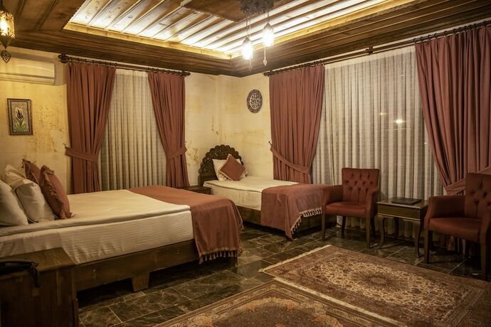 Imagen de la habitación del Garden Suites Hotel Cappadocia. Foto 15