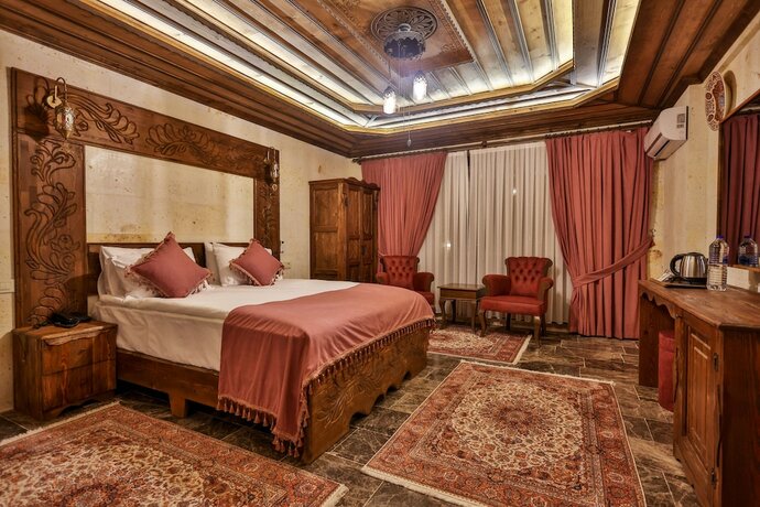 Imagen de la habitación del Garden Suites Hotel Cappadocia. Foto 16