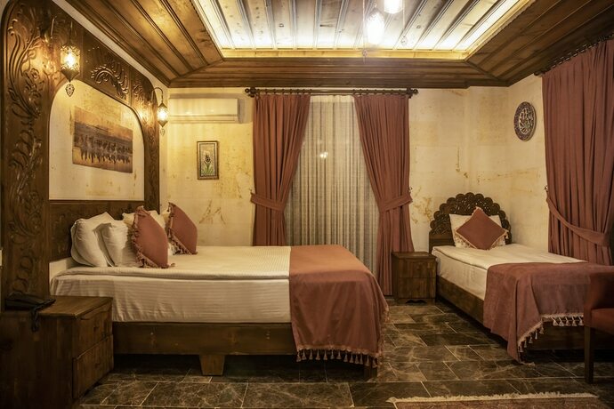 Imagen de la habitación del Garden Suites Hotel Cappadocia. Foto 19