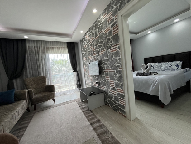 Imagen de la habitación del Gardenya Lara Suit Hotel. Foto 8