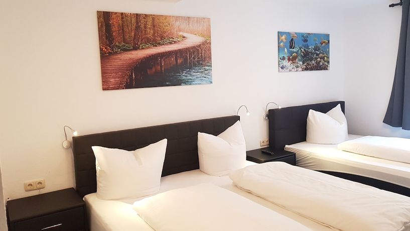 Imagen de la habitación del Garni City Hotel. Foto 10