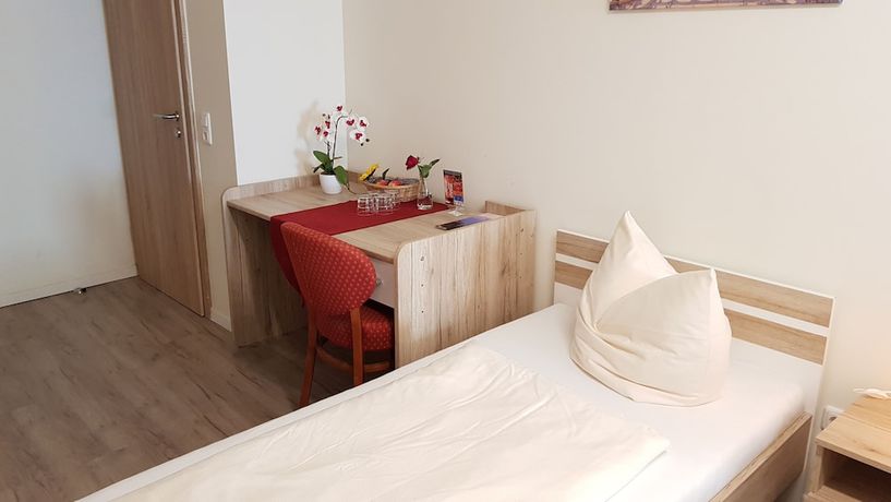 Imagen de la habitación del Garni City Hotel. Foto 12