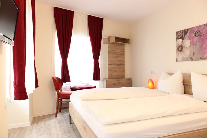 Imagen de la habitación del Garni City Hotel. Foto 15
