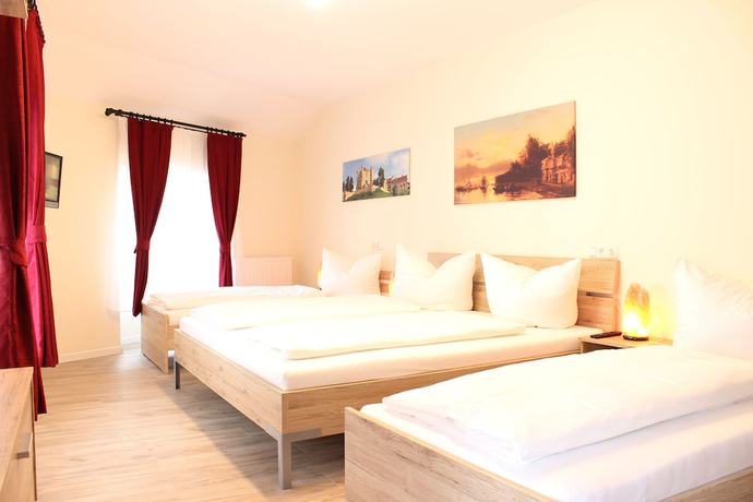 Imagen de la habitación del Garni City Hotel. Foto 16