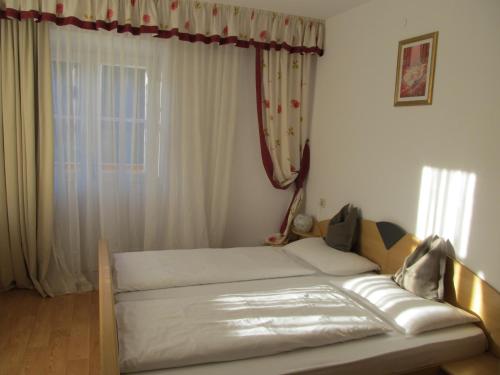 Imagen de la habitación del Garni Hotel Melissa. Foto 10