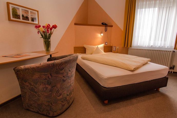 Imagen de la habitación del Garni Hotel and Ferienwohnungen Seeschl&ouml;&szlig;chen. Foto 6