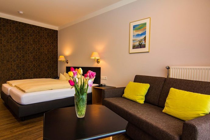 Imagen de la habitación del Garni Hotel and Ferienwohnungen Seeschl&ouml;&szlig;chen. Foto 8