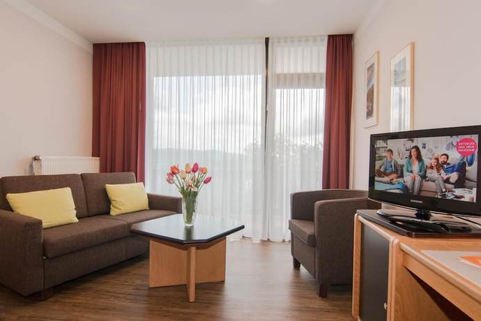 Imagen de la habitación del Garni Hotel and Ferienwohnungen Seeschl&ouml;&szlig;chen. Foto 11