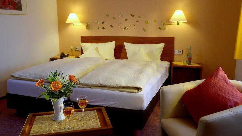 Imagen de la habitación del Garni Hotel and Ferienwohnungen Seeschl&ouml;&szlig;chen. Foto 14