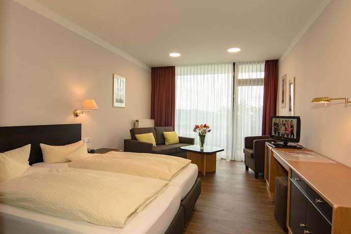 Imagen de la habitación del Garni Hotel and Ferienwohnungen Seeschl&ouml;&szlig;chen. Foto 16