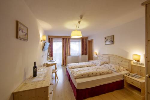 Imagen de la habitación del Garni Residence Diamant. Foto 16