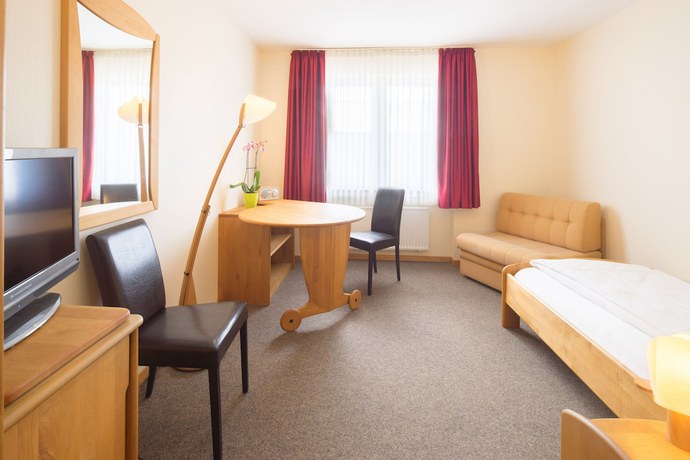 Imagen de la habitación del Garni-Hotel Bonnem-Inn. Foto 17