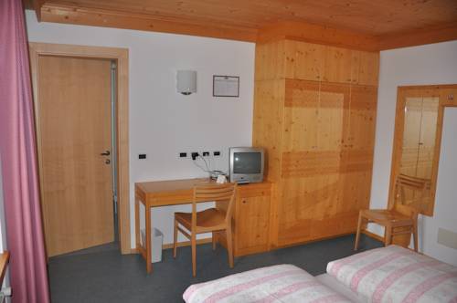 Imagen de la habitación del Garnì Dolomia. Foto 4