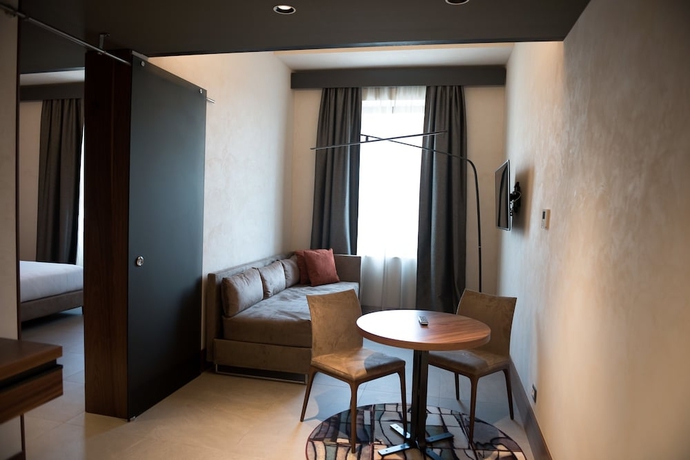 Imagen de la habitación del Gasometer Urban Suites. Foto 10