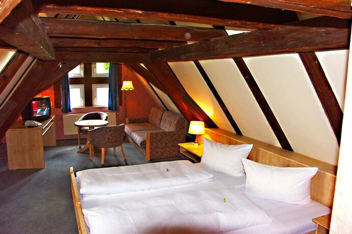 Imagen de la habitación del Gasthof Goldener Adler, Weissenburg in Bayern. Foto 18