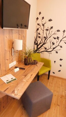 Imagen de la habitación del Gasthof Gr&uuml;ner Baum, Ammelbruch. Foto 19