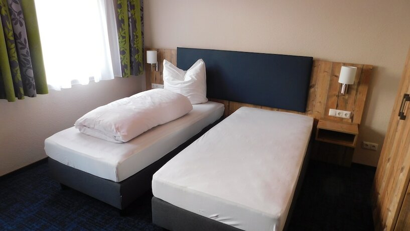 Imagen de la habitación del Gasthof Gr&uuml;ner Baum. Foto 18