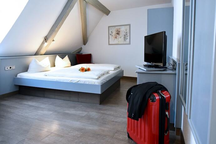 Imagen de la habitación del Gasthof Gr&uuml;ner Baum, Mainsondheim. Foto 13