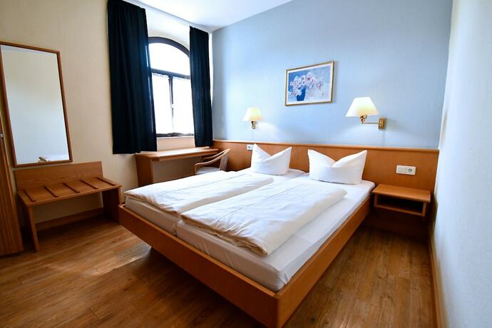 Imagen de la habitación del Gasthof Gr&uuml;ner Baum, Mainsondheim. Foto 14